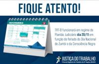 #ParaTodosVerem: Arte gráfica com fundo azul escuro. No topo, a frase "Fique atento" em letras garrafais na cor azul. Abaixo, uma faixa branca com o texto "TRT-8 funcionará em regime de Plantão Judiciário dia 20/11 em função do feriado do Dia Nacional de Zumbi e da Consciência Negra" na cor azul. Ao lado, a fotografia do calendário no mês de Novembro. No canto inferior esquerdo, a logo da Justiça do Trabalho em branco.